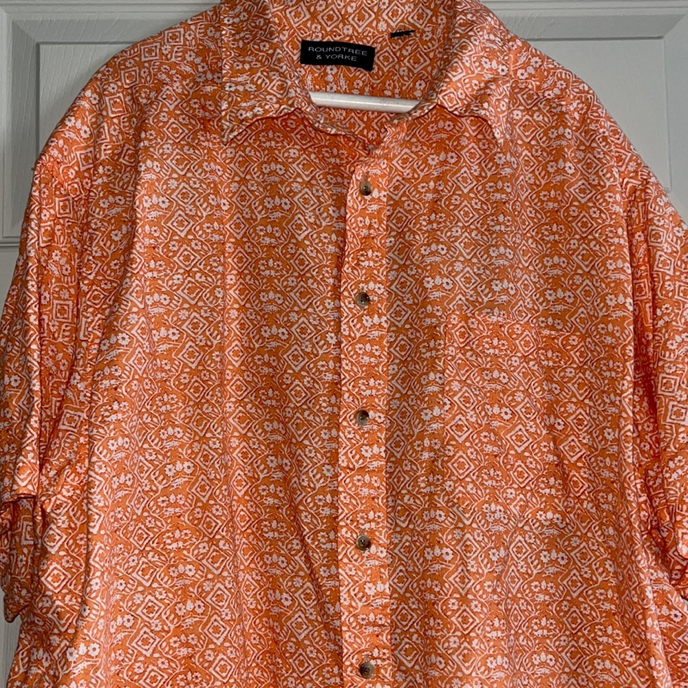 White and orange button up shirt